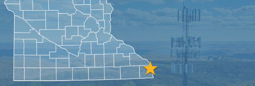 State of Minnesota with counties outlined; a star locating Hokah, a cell tower State of Minnesota with counties outlined; a star locating Hokah, a cell tower
