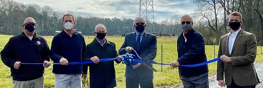Community representatives cut a ribbon near new FirstNet cell site near Moore County, North Carolina. Community representatives cut a ribbon near new FirstNet cell site near Moore County, North Carolina.