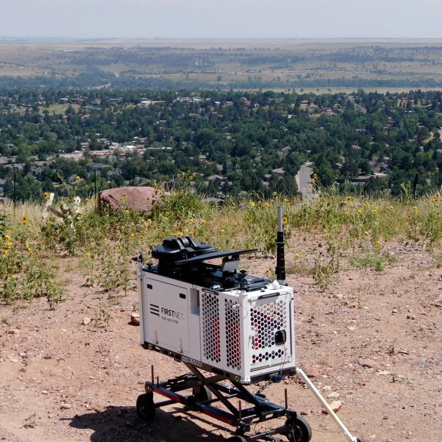 A FirstNet Compact Rapid Deployable asset set up in a field