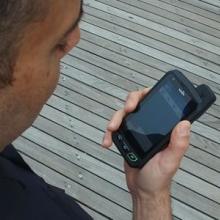 First resonder holding a cell phone