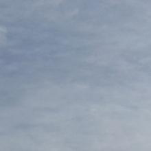 Cell tower against cloudy sky Cell tower against cloudy sky