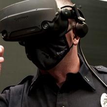 Close view of first responder wearing virtual reality glasses pointing forward. Close view of first responder wearing virtual reality glasses pointing forward.