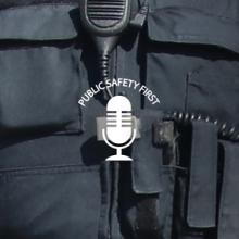 Law enforcement officer holds smartphone in hand; Public Safety First podcast logo Law enforcement officer holds smartphone in hand; Public Safety First podcast logo