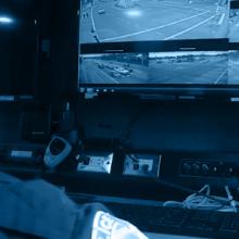 Richmond police officer monitoring cameras showing areas around the city Richmond police officer monitoring cameras showing areas around the city