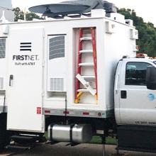 A FirstNet SatCOLT parked near a field during a response