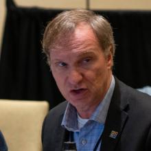 First Responder Network Authority Executive Director and CEO Joe Wassel speaking at a meeting attended by FirstNet Authority staff and public safety officials. 