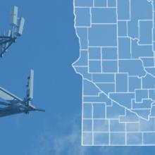 The state of Minnesota, with outlined county borders and Fillmore County highlighted; a cell tower