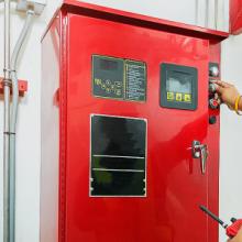 A worker inspects a fire unit