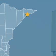 State of Minnesota with counties outlined; a star locating Gunflint Trail, a cell tower