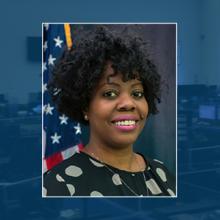 Karima Holmes headshot; Emergency communication center