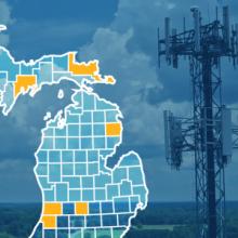 The state of Michigan, with outlined county borders; a cell tower
