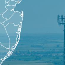 State of New Jersey with counties outlined; Camden and Salem counties highlighted, a cell tower