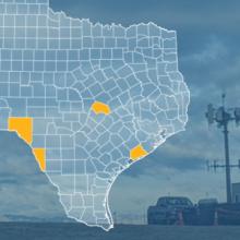 The state of Texas, with outlined county borders; a cell tower.