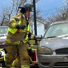 FirstNet connects ambulances at the network’s edge with HPUE An EMS responder from the Bristol Kendall Fire Protection District with a stretcher at a damaged vehicle