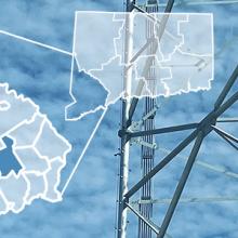 County map of Connecticut, city outlines of Fairfield County, cell tower against clouds County map of Connecticut, city outlines of Fairfield County, cell tower against clouds