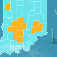 The FirstNet Network Expands Across Indiana The state of Indiana, with outlined county borders; a cell tower.