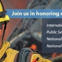 A firefighter in safety gear and helmet looks out, behind him is debris from a building. Text in the image reads "Join us in honoring our public safety heroes: International Firefighters Day | May 4, Public Service Recognition Week | May 5-11, National Police Week |  May 13-17, National EMS Week | May 19-25"   