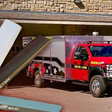  High Power User Equipment; Two Shawnee County Fire District #4 response vehicles parked in front of the firehouse. 