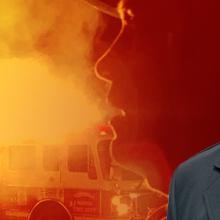 Firefighters and fire truck respond to an emergency; FirstNet Authority employee and volunteer firefighter/emergency medical technician Zach Smith in uniform