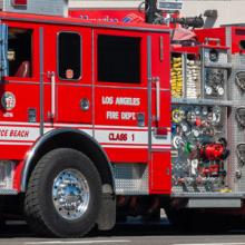 A Los Angeles Fire Department truck sits on the street.