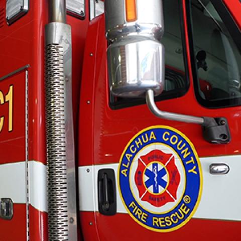 Alachua County Fire Rescue truck parked inside fire station