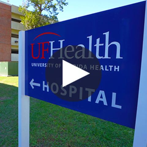 Sign pointing towards University of Florida Health hospital 