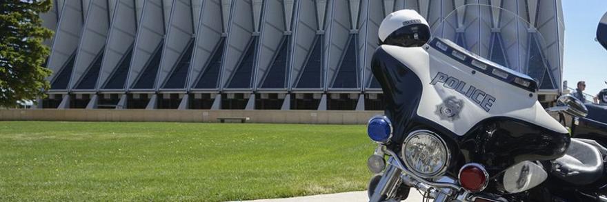 Police motorcycle outside a building