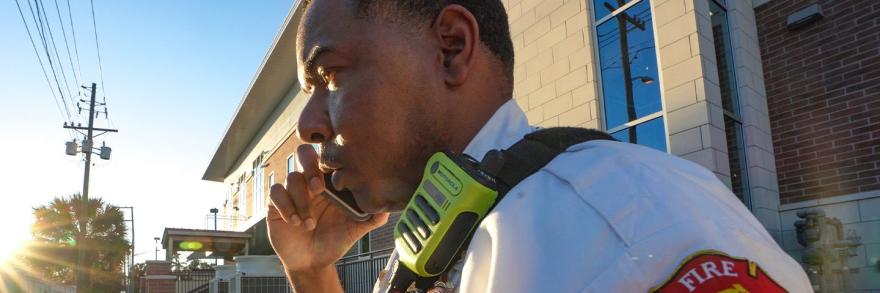 A Gainesville firefighter uses a FirstNet cell phone