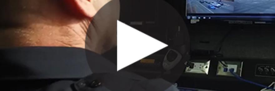 An officer with the city of Richmond reviews video footage 