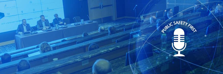 Panelists from the 2025 5x5 in front of an audience presenting on satellite to device technologies, Public Safety First podcast logo 