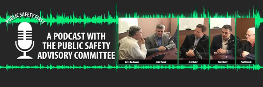 Representatives of the FirstNet Authority Public Safety Advisory Committee speak to Dave Buchanan 