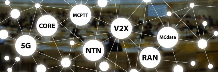 Photo of a meeting room with people sitting and working on computers, overlaid with circles connected with lines, suggesting networking. Circles contain wireless network terminology: “5G; CORE; MCPTT; NTN; V2X; RAN; MCdata”