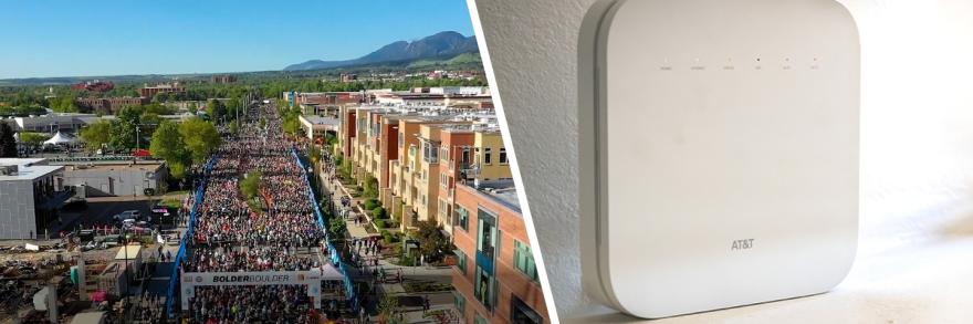 Runners at the BOLDERBoulder 10k road race in Boulder, Colorado; a Cell Booster Pro on a table.