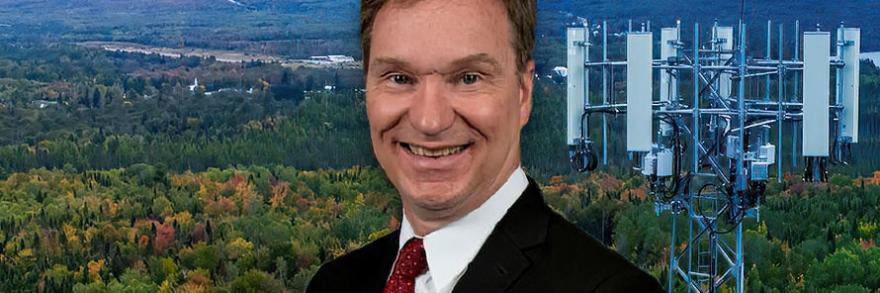 Joe Wassel headshot, FirstNet cell tower
