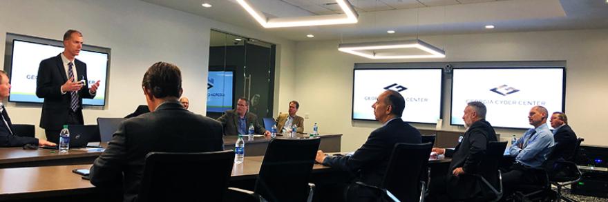 FirstNet Board members sit and listen to a presentation during a visit the Georgia Cyber Center
