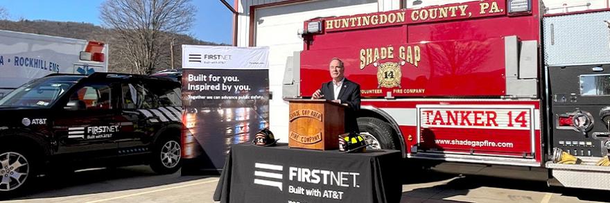 John Joyce talking outside in front of a fire truck during a press event in Huntingdon County, PA.