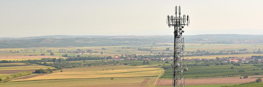 "Expanding rural broadband coverage through FirstNet;" A cell tower located in a rural farm town