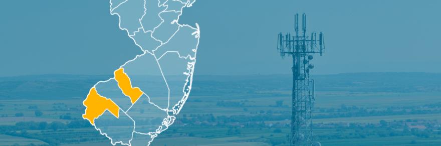 State of New Jersey with counties outlined; Camden and Salem counties highlighted, a cell tower