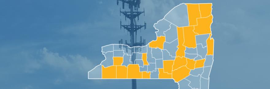 The state of New York, with outlined county borders; a cell tower.