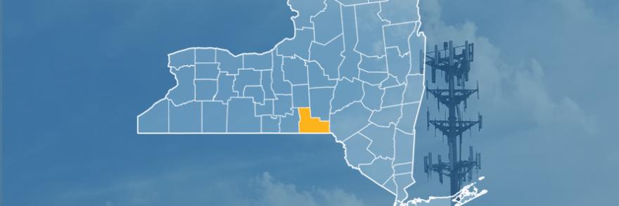 The State of New York, with outlined county borders; a cell tower.