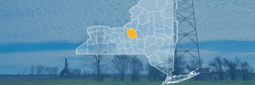 The state of New York, with outlined county borders; a cell tower.