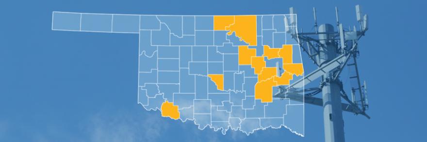The state of Oklahoma, with outlined county borders; a cell tower