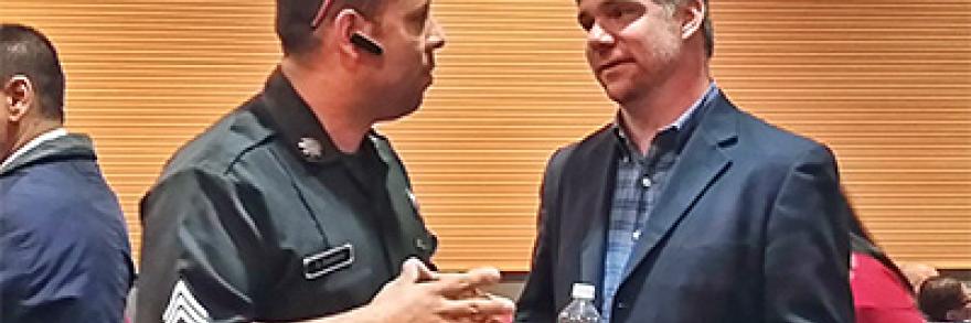 A member of the FirstNet Authority’s Public Safety Advocacy team speaks with an officer at one of the 500 engagements from across the nation. 