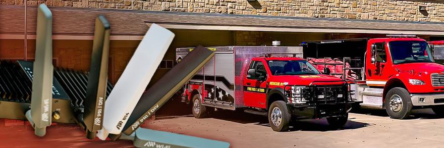  High Power User Equipment; Two Shawnee County Fire District #4 response vehicles parked in front of the firehouse. 