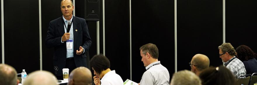 Sheriff Richard Stanek speaks to an audience at a conference.