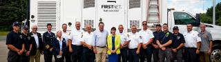 Congressman Richard Hudson, Assistant Secretary of Commerce for Communications and Technology Arielle Roth, and Elon, North Carolina first responders; FirstNet SatCOLT
