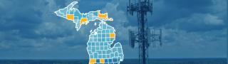 The state of Michigan, with outlined county borders; a cell tower