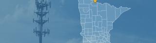 Map of Minnesota with a star over the town of Baudette; a cell tower