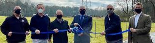 Community representatives cut a ribbon near new FirstNet cell site near Moore County, North Carolina.
