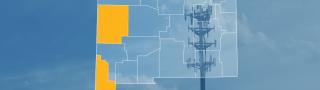 The state of New Mexico, with outlined county borders; a cell tower.